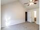 Spacious bedroom with neutral carpet, and access to a hallway, bathroom, and staircase at 844 Glenshire Ct, Riverdale, GA 30274