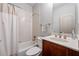 Clean bathroom featuring a tub/shower combo and a single vanity at 961 Persimmon Pt, Atlanta, GA 30328