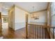 An inviting space with beautiful hardwood floors, chandelier, and elegant wall trim at 961 Persimmon Pt, Atlanta, GA 30328