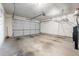 Spacious two car garage with storage racks and automatic door at 961 Persimmon Pt, Atlanta, GA 30328