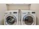Laundry room featuring front-load washer and dryer at 961 Persimmon Pt, Atlanta, GA 30328
