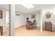 Basement area featuring a home office setup, combining work and relaxation in a single room at 345 W Spalding Dr, Sandy Springs, GA 30328
