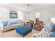 Spacious living room with hardwood floors, comfortable seating, and bright lighting at 345 W Spalding Dr, Sandy Springs, GA 30328
