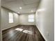 Bedroom featuring new LVP flooring, fresh paint, recessed lighting, and lots of natural light at 3559 Sawmill Ter, Marietta, GA 30062