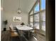Bright dining room with large windows, modern light fixture, and stylish table set at 3559 Sawmill Ter, Marietta, GA 30062