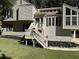 Lovely house with a well-maintained lawn, welcoming stairs, and beautiful landscaping around the house at 3559 Sawmill Ter, Marietta, GA 30062