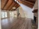 Spacious living room with vaulted wood ceilings, stone fireplace, and hardwood floors that bring warmth at 3559 Sawmill Ter, Marietta, GA 30062