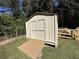 Exterior view of storage shed with ramp, adjacent to grass and fence line at 3559 Sawmill Ter, Marietta, GA 30062