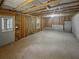 Unfinished basement space with exposed framework and concrete floor at 4963 Arbor View Nw Pkwy, Acworth, GA 30101