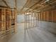 Unfinished basement with exposed wooden beams and framework at 4963 Arbor View Nw Pkwy, Acworth, GA 30101