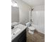 Bathroom featuring a granite countertop vanity, white cabinets, framed mirror, and shower-over-tub combination at 4963 Arbor View Nw Pkwy, Acworth, GA 30101