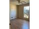 Bedroom featuring laminate flooring, a ceiling fan, and a sunlit window at 740 Kibbe Cir, Lawrenceville, GA 30044