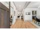 Bright and airy foyer with hardwood floors, leading to dining area, living room, and kitchen at 1055 Ormewood Se Ave, Atlanta, GA 30316