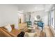 Stylish living room featuring sleek furniture, neutral walls, and hardwood floors at 1055 Ormewood Se Ave, Atlanta, GA 30316