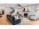 Open concept living space with a fireplace and hardwood floors at 1055 Ormewood Se Ave, Atlanta, GA 30316