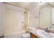 Bathroom featuring a bathtub with shower and a vanity with sink at 1947 Phillips Lake Blf, Lithonia, GA 30058