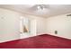 Spacious living room with open access to the staircase at 1947 Phillips Lake Blf, Lithonia, GA 30058
