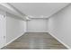 Finished basement offers ample space with new flooring and neutral paint at 5277 Cardinal Nw Ln, Lilburn, GA 30047