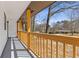 Inviting front porch with natural wood railing, perfect for enjoying the outdoors at 5277 Cardinal Nw Ln, Lilburn, GA 30047