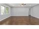 Bright living room with hardwood floors, neutral walls, and a comfortable ambiance at 5277 Cardinal Nw Ln, Lilburn, GA 30047