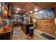 Elegant kitchen with wood accents, a central island, and sleek, modern appliances at 80 Rountree Rd, Riverdale, GA 30274