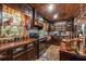 Charming kitchen featuring wooden cabinets, stone countertops, and stainless steel appliances at 80 Rountree Rd, Riverdale, GA 30274