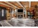 Wood paneled living room with hard wood floors, fireplace, and glass encased liquor cabinet at 80 Rountree Rd, Riverdale, GA 30274