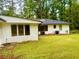 A view of the home's backyard showing the AC units at 1332 Willis Mill Sw Rd, Atlanta, GA 30311