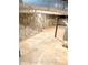 Unfinished basement showcasing stone foundation walls and concrete flooring at 1332 Willis Mill Sw Rd, Atlanta, GA 30311