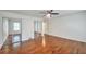 Spacious bedroom features hardwood floors, large mirrored closets, and fresh paint at 1332 Willis Mill Sw Rd, Atlanta, GA 30311