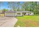 Lovely one-story home featuring an attached garage and well-maintained yard, perfect for suburban living at 1332 Willis Mill Sw Rd, Atlanta, GA 30311