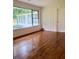 Inviting living room with hardwood floors and large window view at 1332 Willis Mill Sw Rd, Atlanta, GA 30311