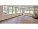Bright screened porch with fresh paint, built-in shelves, new laminate floors and a peaceful ambiance at 1332 Willis Mill Sw Rd, Atlanta, GA 30311