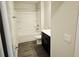 Bathroom with shower-tub combo and vanity that provides a clean and functional space at 145 Scarlett Place Dr, Bowdon, GA 30108