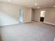 Spacious bedroom with neutral carpet and trim, ready for personalization and comfort at 145 Scarlett Place Dr, Bowdon, GA 30108