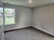 Comfortable bedroom with plush carpeting, bright natural light, and a quiet atmosphere at 145 Scarlett Place Dr, Bowdon, GA 30108
