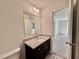 Bathroom featuring granite countertops and a view into the bedroom at 3275 Wild Basil Ln, Buford, GA 30519