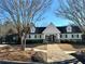 Community clubhouse with a pathway leading to the entrance at 3275 Wild Basil Ln, Buford, GA 30519