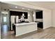 Well-lit kitchen featuring stainless steel appliances, granite countertops, and an open layout at 3275 Wild Basil Ln, Buford, GA 30519