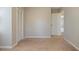 Bedroom featuring carpet floors, closet, and neutral-colored walls that offers a clean and simple design at 5812 Dogwood Cir, Austell, GA 30168