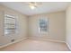 Bright bedroom with natural light, carpet floors, and neutral walls providing a cozy atmosphere at 5812 Dogwood Cir, Austell, GA 30168
