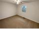 Neutral bedroom with window and ceiling fan at 832 Overlook Trl, Canton, GA 30115