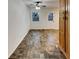 The dining area features patterned floors and built-in wooden cabinets at 832 Overlook Trl, Canton, GA 30115