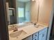 The primary bathroom is updated with double sinks, walk in shower and a relaxing soaking tub at 112 Scarlett Place Dr, Bowdon, GA 30108