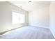 Bright carpeted bedroom has a large window offering natural light at 2076 Greenridge Se Rd, Smyrna, GA 30080