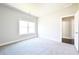 Cozy bedroom with carpet flooring and a bright window at 2076 Greenridge Se Rd, Smyrna, GA 30080