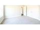 Cozy bedroom featuring a neutral palette, new carpet, closet, and great natural light at 2076 Greenridge Se Rd, Smyrna, GA 30080