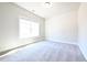 This bright bedroom has neutral paint and a large window for lots of light at 2076 Greenridge Se Rd, Smyrna, GA 30080