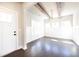Inviting dining area with hardwood floors, wood beam ceiling, and ample natural light at 2076 Greenridge Se Rd, Smyrna, GA 30080