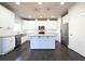 Beautiful kitchen with white cabinets, stainless steel appliances, and dark hardwood floors at 2076 Greenridge Se Rd, Smyrna, GA 30080